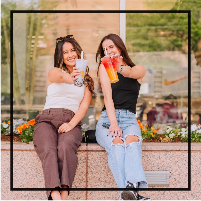 Girls showing cold drinks